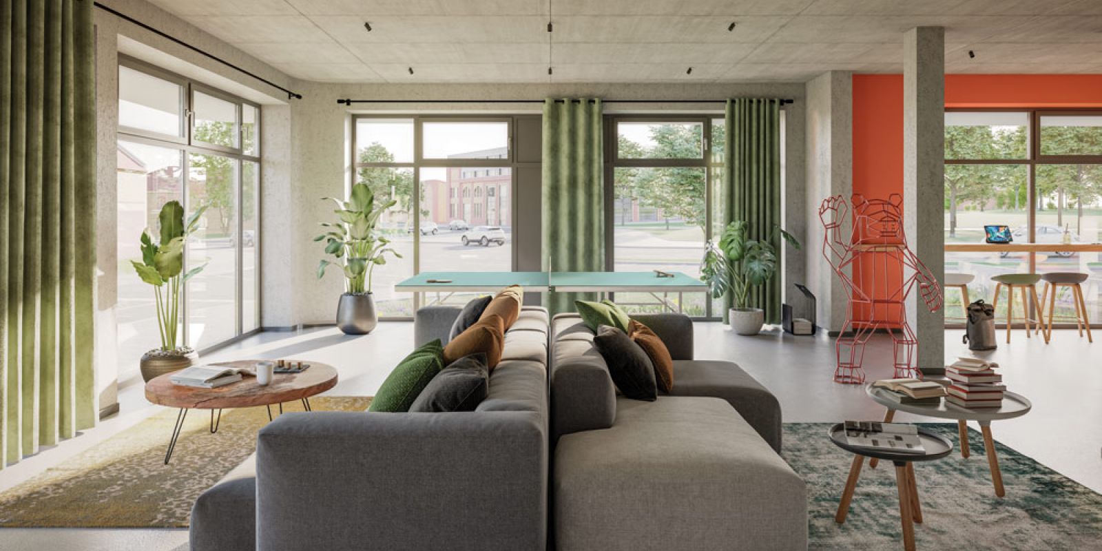 Moderne Lobby mit Lounge, Sofas, Pflanzen und Coworking-Bereich im Studentenwohnheim Magdeburg, lichtdurchflutet.